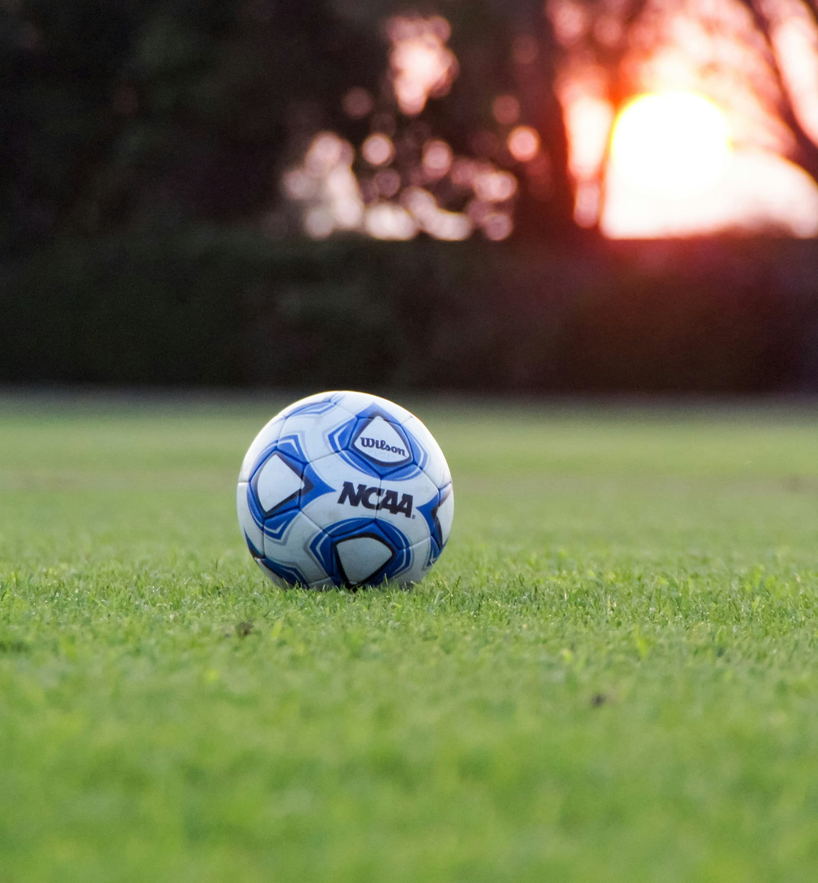 Helpful Tips For The College Recruiting Process NCAA soccer ball on grass field during stadium evening lighting